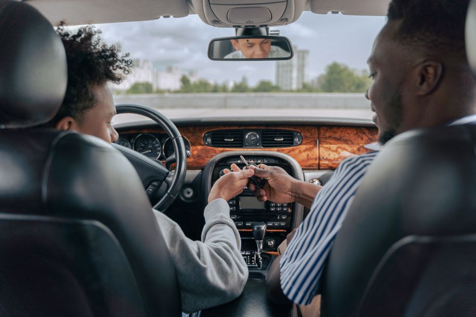 Learner driver at the wheel during a driving lesson.